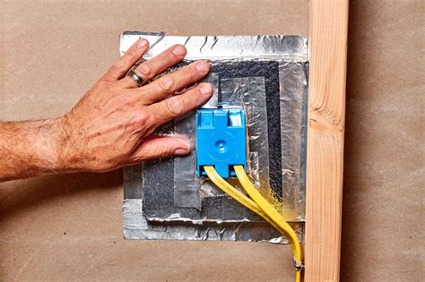 dark colored insulation around electrical boxes in attic|insulation for attic junction boxes.